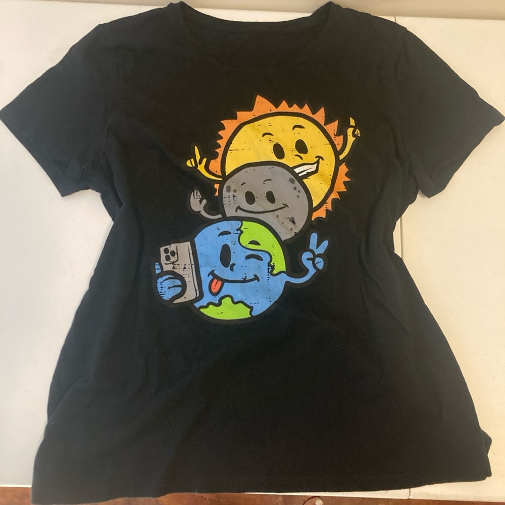 Black Graphic Tee with Sun, Moon, and Earth Design